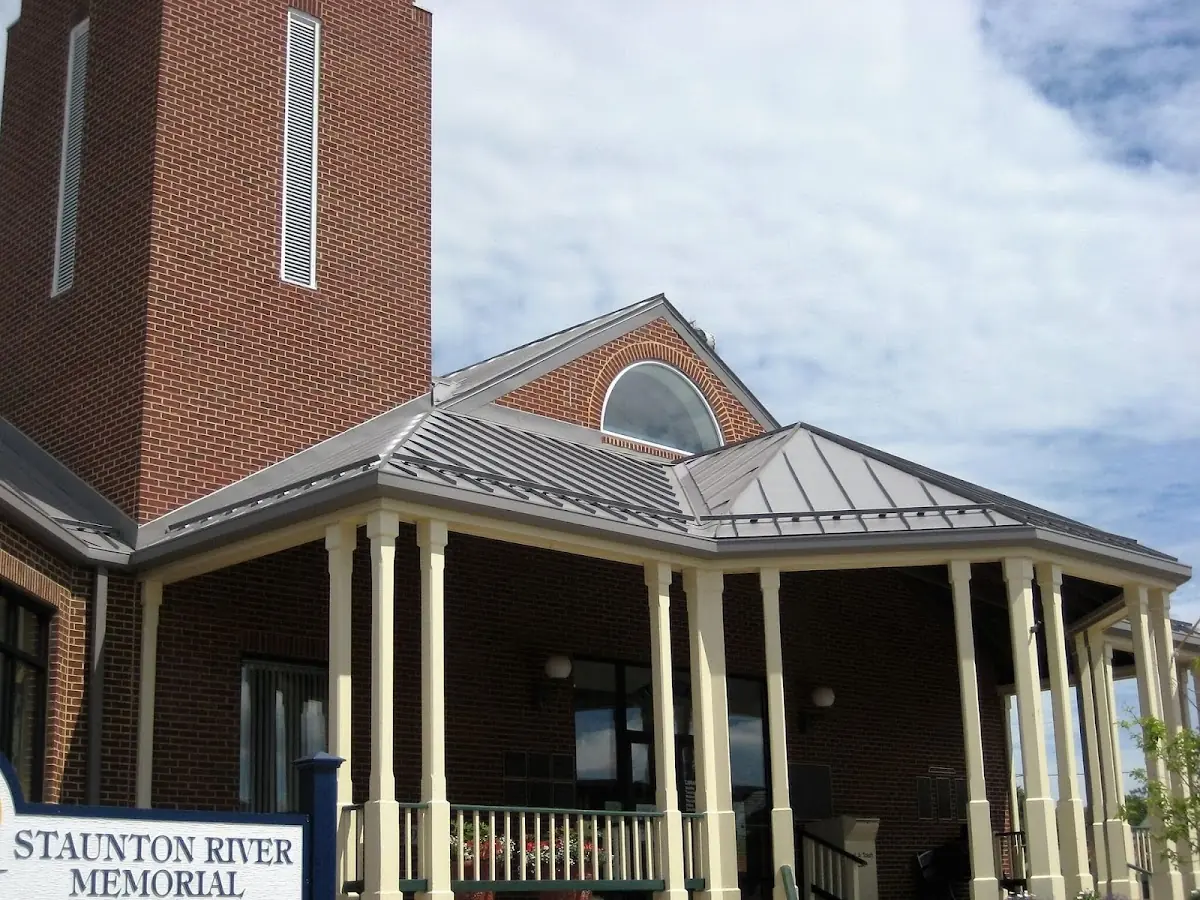 Skilled roofing craftsmen working on a residential roof in Ontario